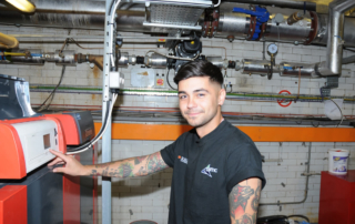 Artic Engineer looking after a boiler